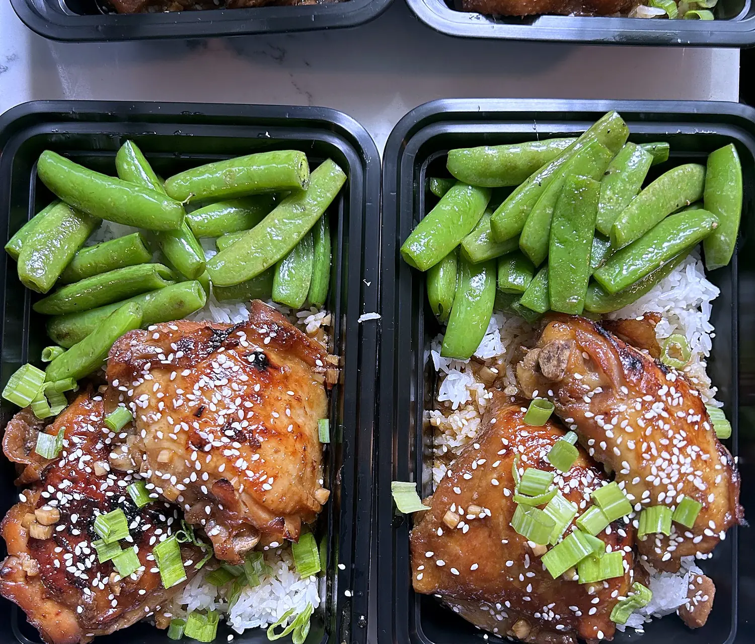 Shoyu chicken thighs over rice with snap peas
